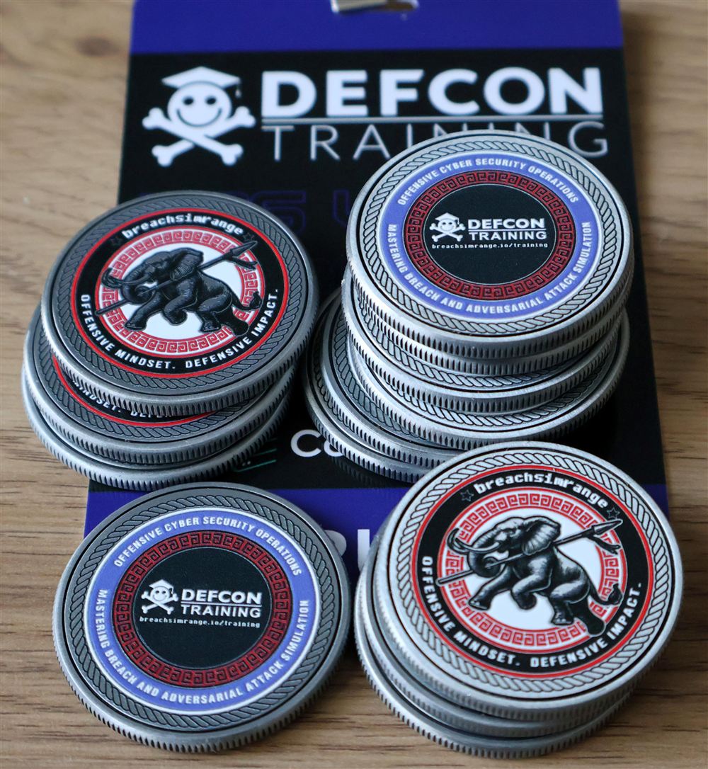 CBAS challenge coins from BreachSimRange and DEF CON Training